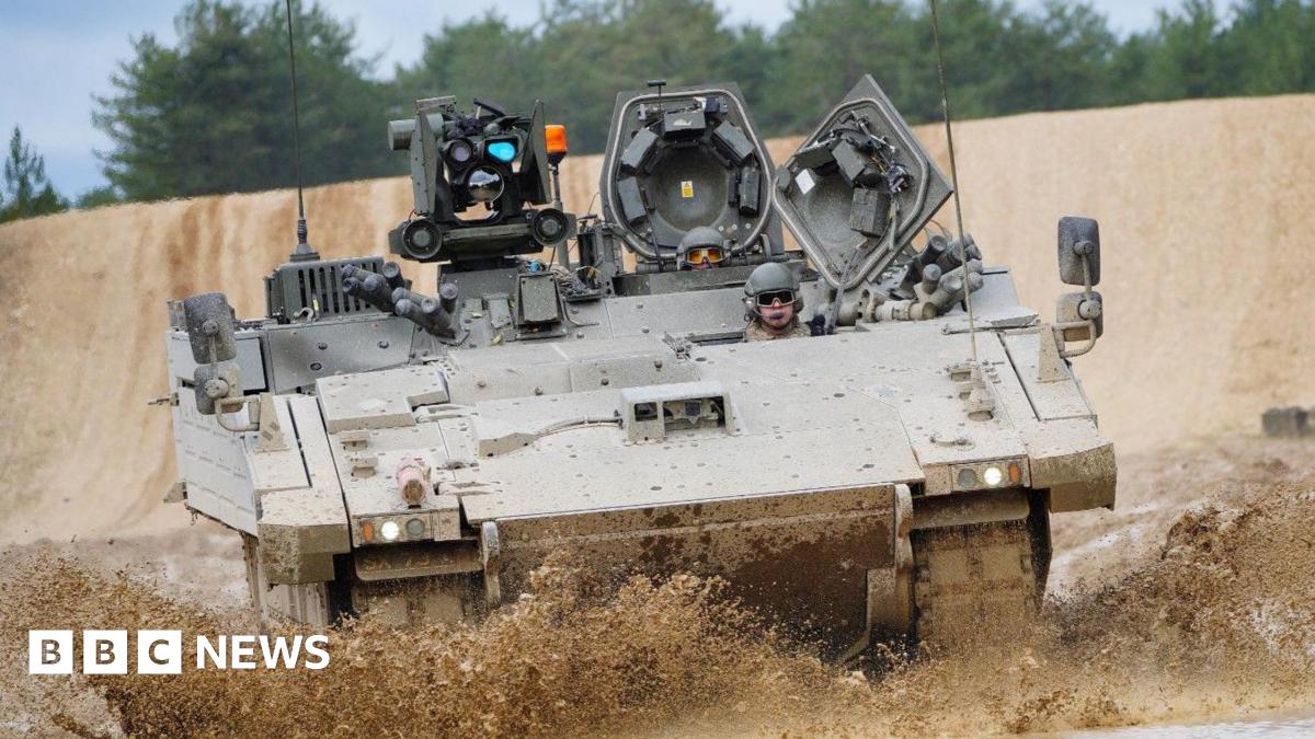 An Ajax Ares tank, an armored personnel carrier, on the training range at Bovington Camp