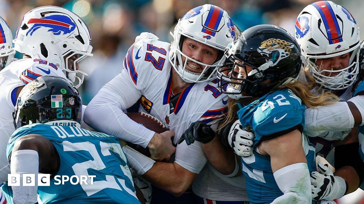 Buffalo Bills quarterback Josh Allen is tackled against the Jacksonville Jaguars