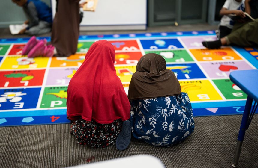 Children read at ABC Learning Center Inc. in Minneapolis, Minnesota, on December 30.