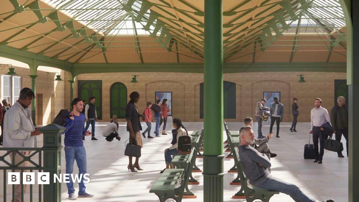 An artist's impression of a station concourse spanned by a Victorian-style roof. The pitched roof has a double apex and is part-glazed and is resting on green metal work at its edges and sides. Passengers are milling around in the space and sitting on benches in its middle.