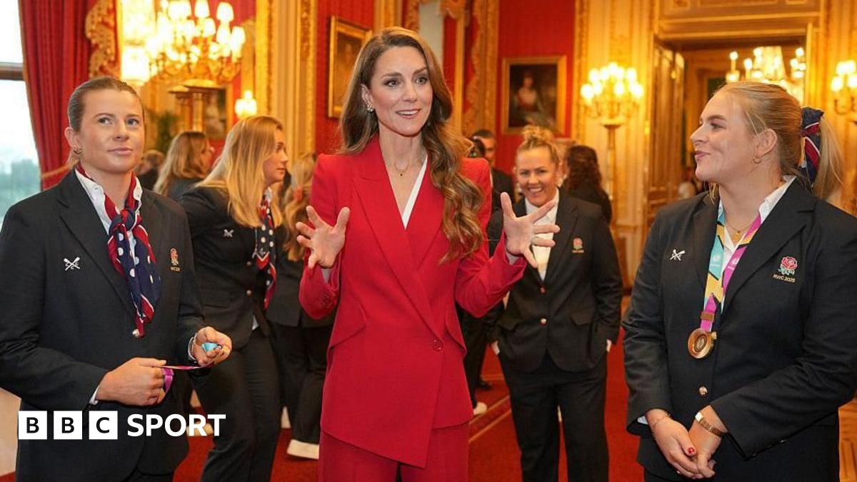 The Princess of Wales holds a white England rugby shirt and is speaking to Zoe Stratford