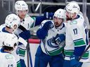 Vancouver Canucks winger Conor Garland celebrates his  first period goal against the Penguins on Oct. 21 in Pittsburgh. 