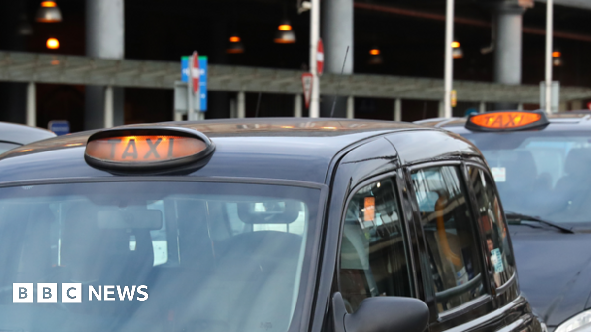 A generic shot of taxis in Greater Manchester