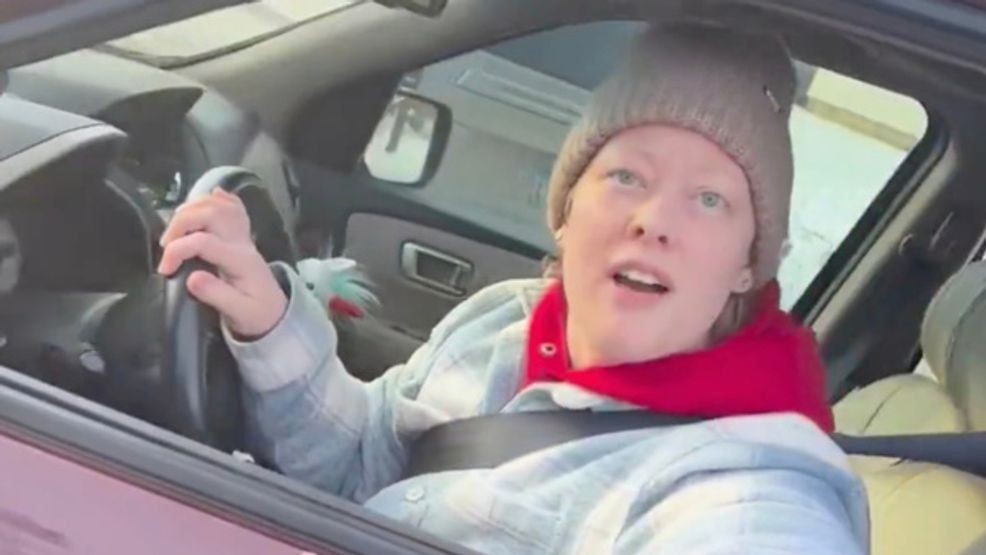 This image from video made by Immigration and Customs Enforcement officer Jonathan Ross via Alpha News shows Renee Good in her vehicle in Minneapolis on Wednesday, Jan. 7, 2026. (AP Photo)
