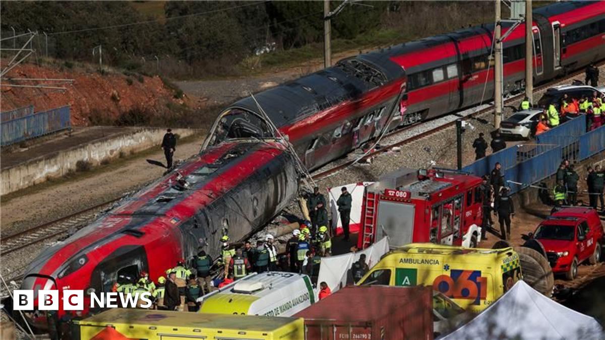 Responders and emergency workers surround the derailed train with ambulances and personnel in a wide shot taken on Monday.