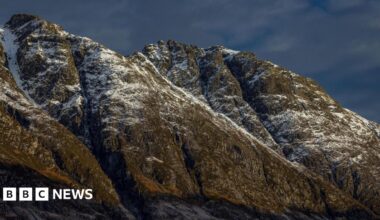 The ridge is a jagged area of steep sided, rocky cliffs and gullies. Mist hangs over the ridge.