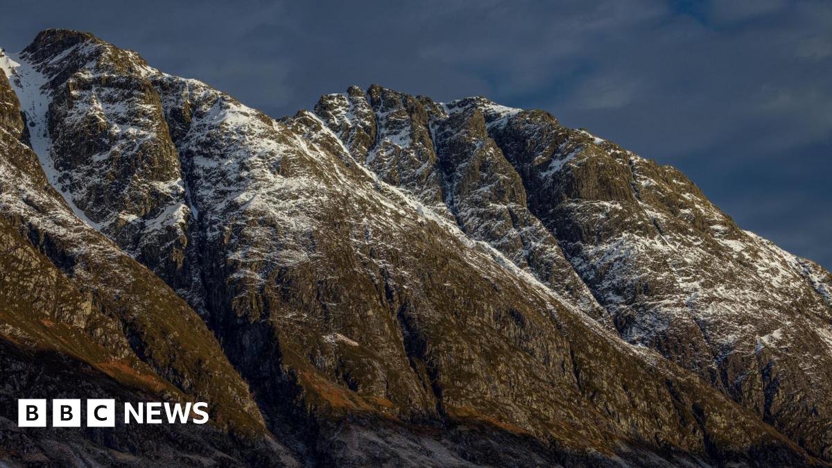 The ridge is a jagged area of steep sided, rocky cliffs and gullies. Mist hangs over the ridge.