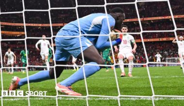Senegal goalkeeper Eduoard Mendy catches Morocco's Brahim Diaz's Panenka penalty in Africa Cup of Nations final