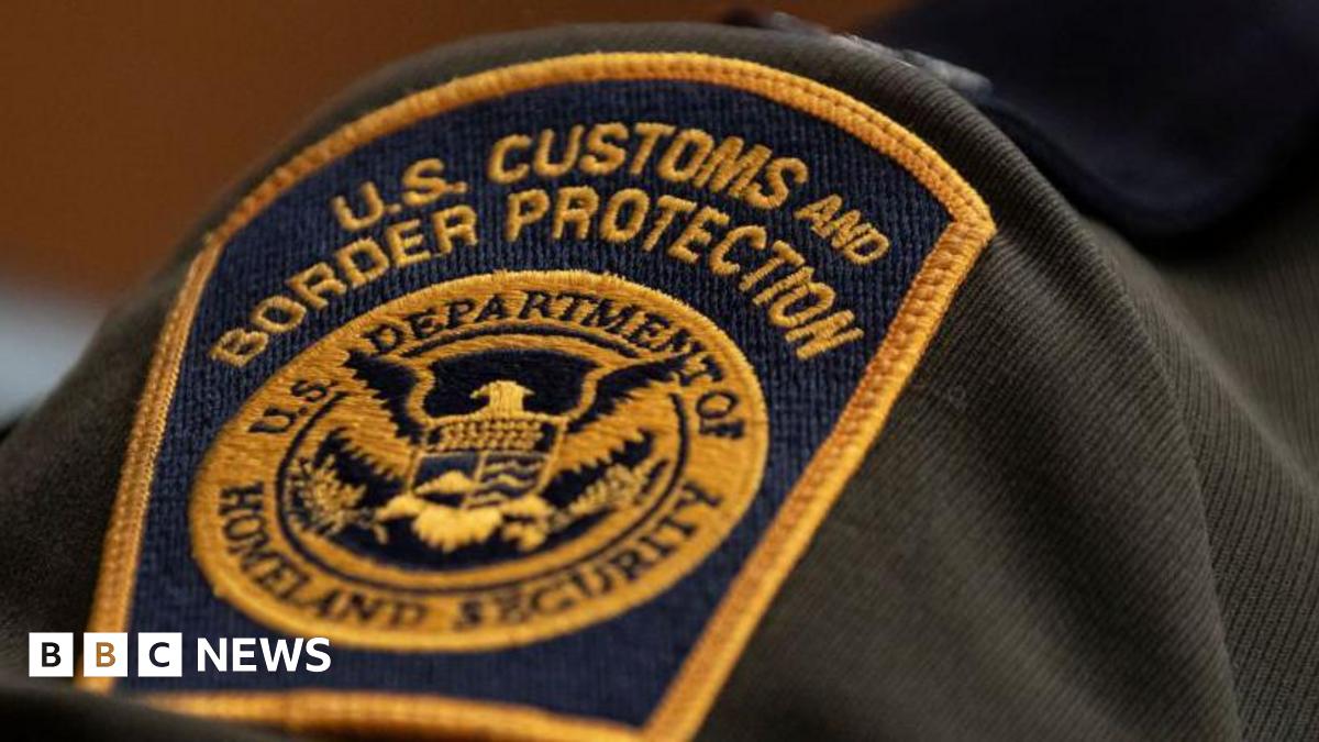 A close-up of a US Customs and Border Patrol patch seen on an agent's shoulder