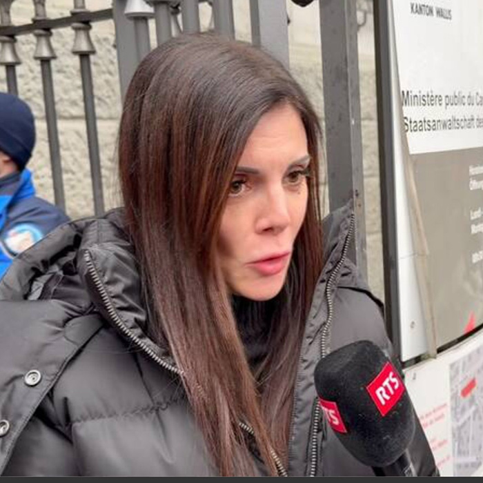 Woman in black jacket speaking to RTS reporter about Swiss ski resort fire that claimed 40 lives and waitress suspected fate revealed Woman in black jacket speaking to RTS reporter about Swiss ski resort fire that claimed 40 lives and waitress suspected fate revealed
