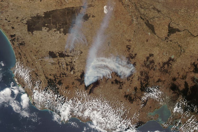 Satellite photo showing a plume of smoke