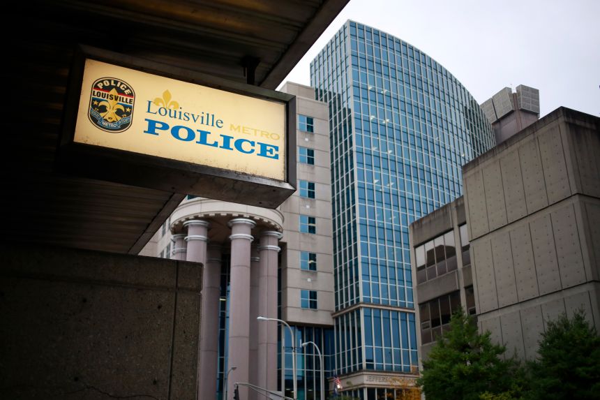 Signage is displayed outside the Louisville Metro Police headquarters in Louisville, Kentucky, on October 25, 2021.