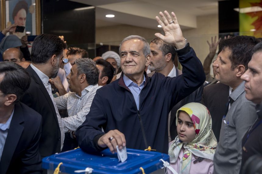 Massoud Pezeshkian casts his vote in the presidential election on June 28, 2024 in Tehran, Iran.
