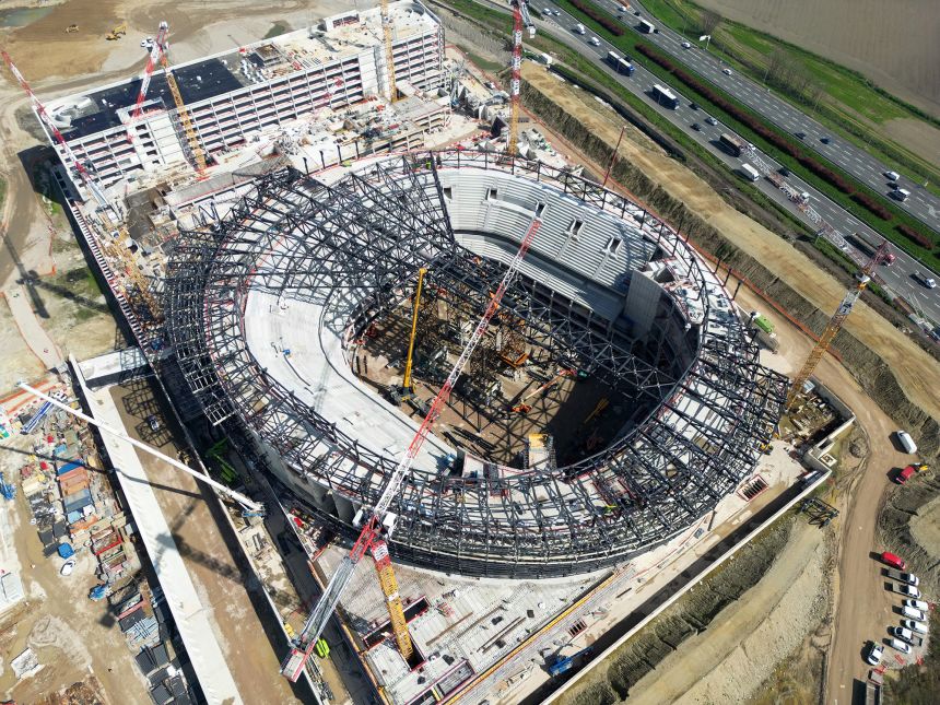 An aerial view of the Milano Santagiulia Ice Hockey Arena located in the Santa Giulia district of Milan, Italy.