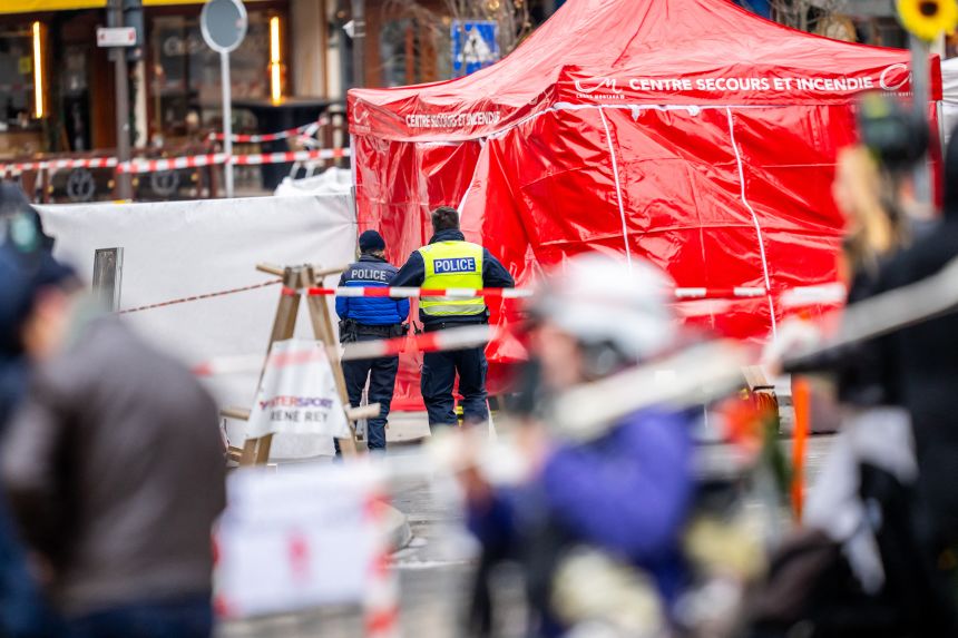 Police officers control the entrance to the bar Le Constellation where a fire ripped through the venue during New Year's celebrations in the Alpine ski resort town of Crans-Montana killing around 40 people and injuring more than 100 others, in Crans-Montana on January 2, 2026.