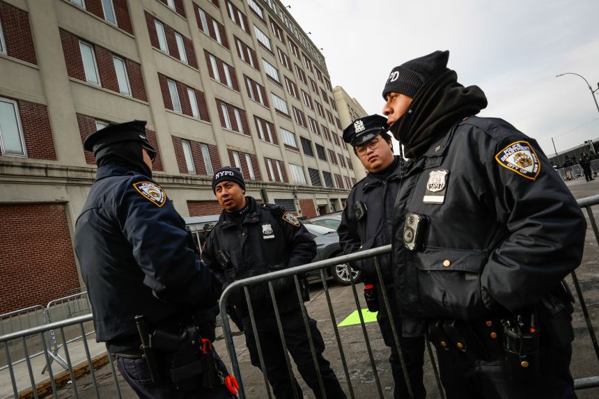 New York City Police Department (NYPD) officers stand guard outside the Metropolitan Detention Center in the Brooklyn borough of New York City, where ousted Venezuelan president Nicolas Maduro is being held on January 5, 2026.