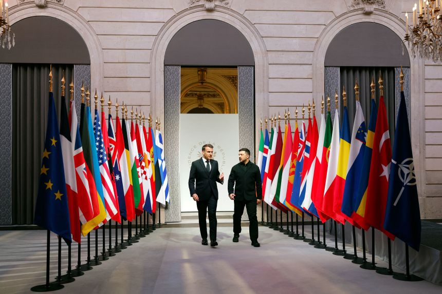 Macron speaks with Zelensky as they arrive for the Coalition of the Willing meeting.