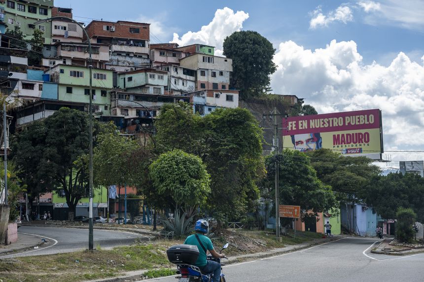 Posters of captured President Nicolas Maduro on the streets of Caracas.