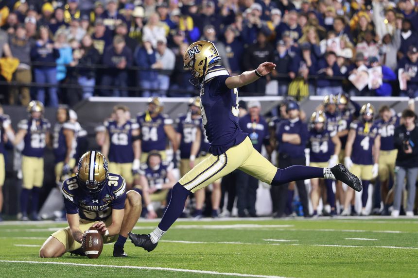 Myles Sansted kicks the game-winning extra point in overtime to win the FCS Championship.
