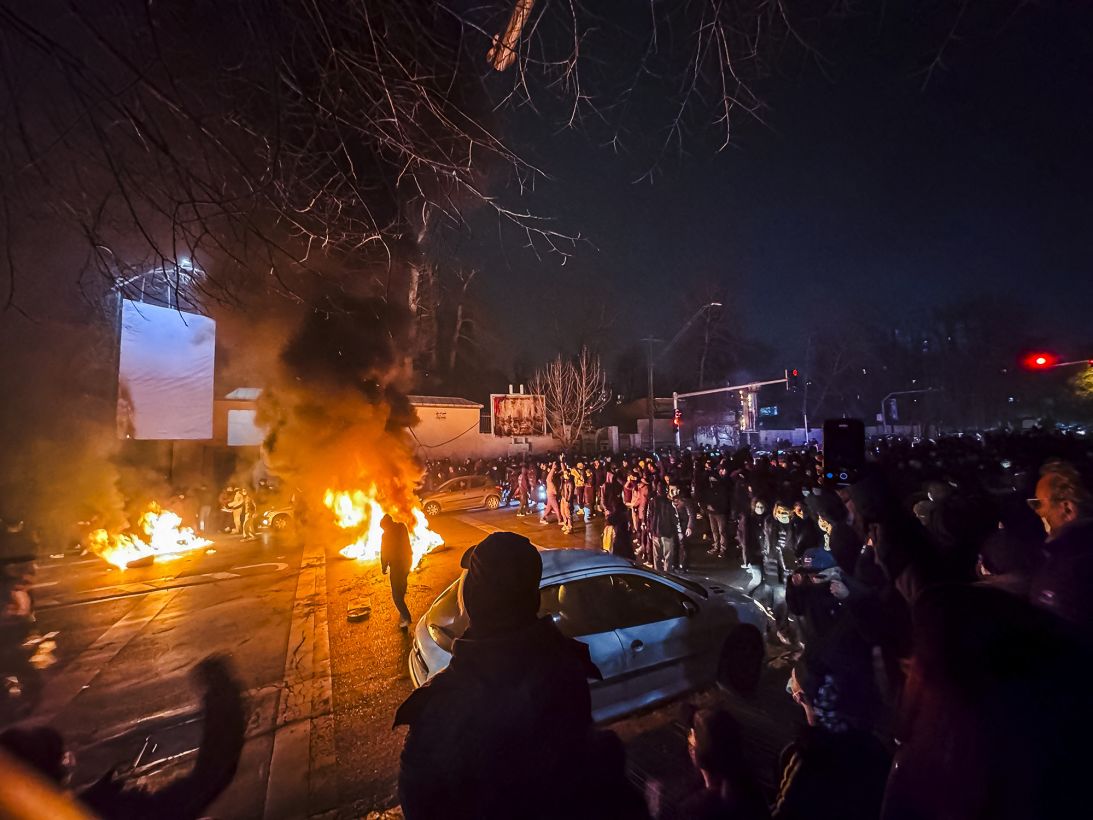 Iranians gather while blocking a street during a protest in Tehran, Iran on January 9, 2026.