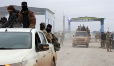 Kurdish forces retreat as government troops advance across northern Syria