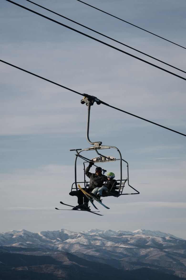 Skiers ride up a chairlift at Deer Valley in Park City, Utah, on December 11, 2025.