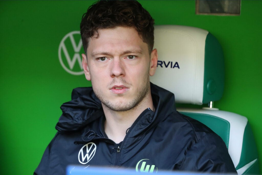 Rangers winger andreas Skov Olsen sits on the bench during his time at Wolfsburg.