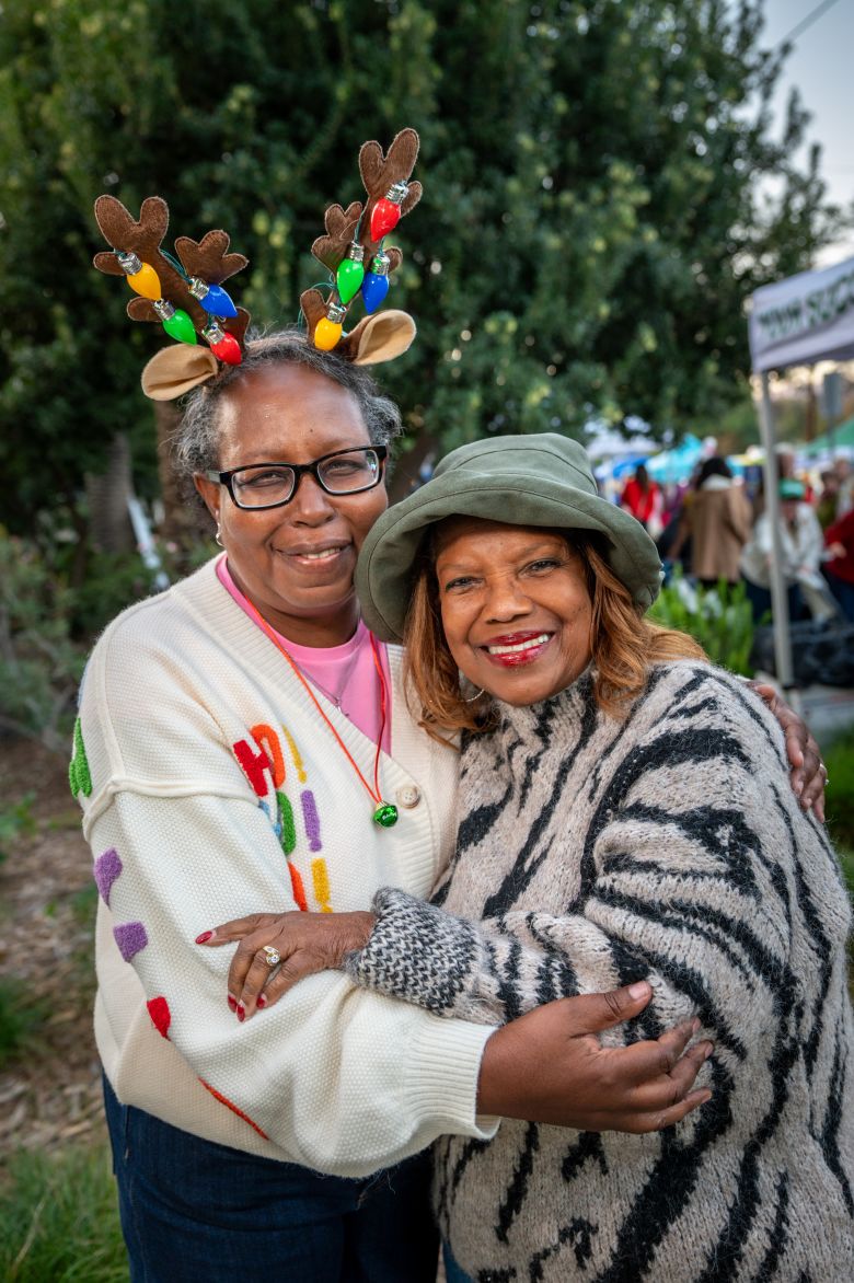 Altadena residents Phyllis Cremer, left, and Judy Matthews, right, have been actively helping the community after the devastating Eaton Fire.