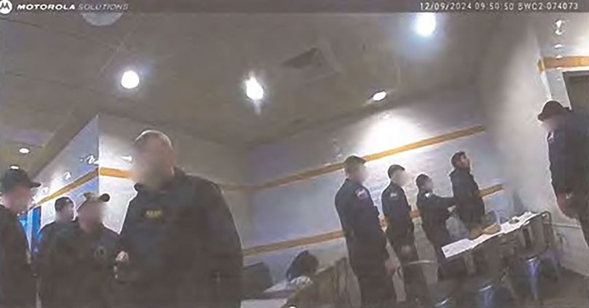 Luigi Mangione is arrested at a McDonald's in a still from body camera footage.