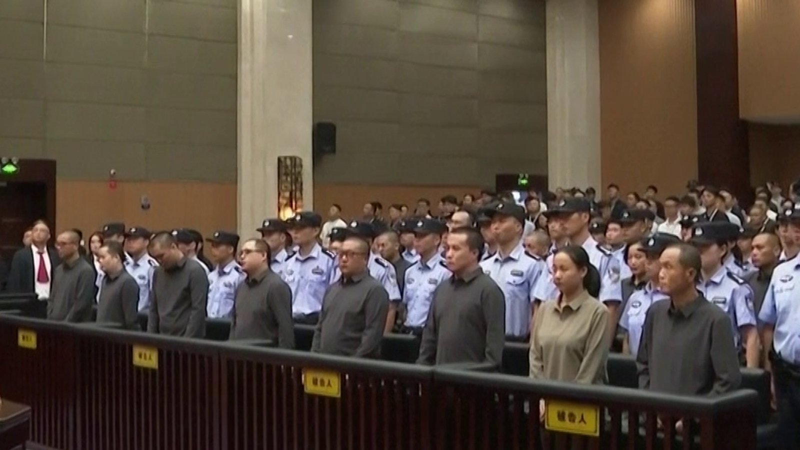 Members of the Ming family in court. Pic: CCTV/AP