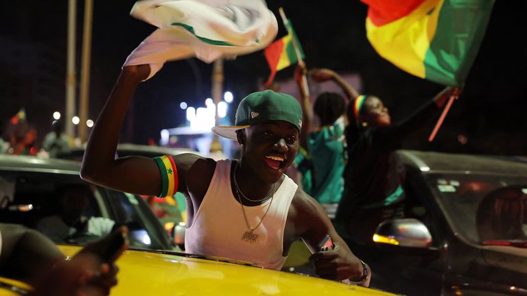 Senegal fans celebrate. Pic: Reuters