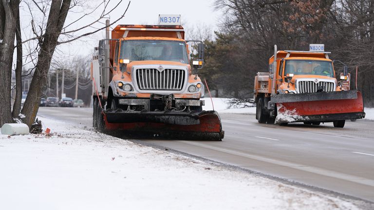 Snow ploughs in Northbrook, Illinois, on Thursday. Pic: AP
