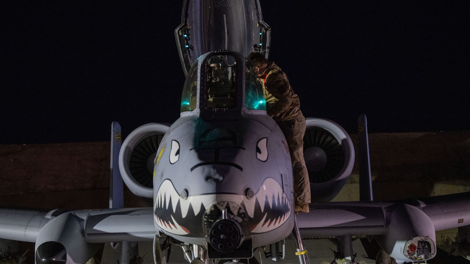 An American airman prepares an A-10 Thunderbolt ahead of his mission. Pic: AP