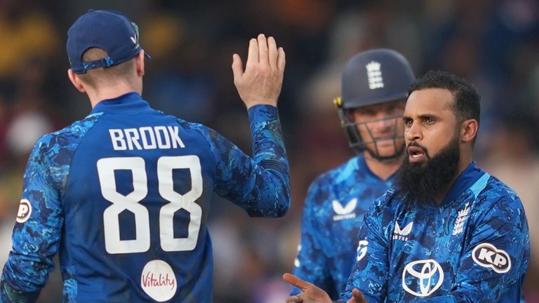 England's Adil Rashid celebrates the wicket of Sri Lanka's captain Charith Asalanka (Associated Press) 