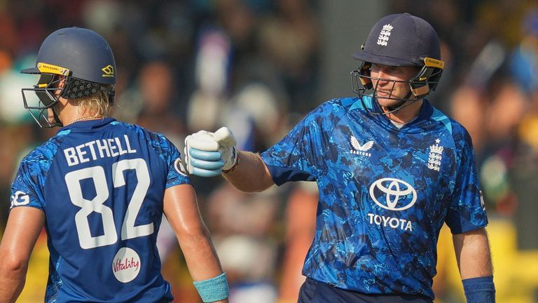England's Joe Root congratulates Jacob Bethell for scoring a fifty runs during the third ODI with Sri Lanka (Associated Press)  