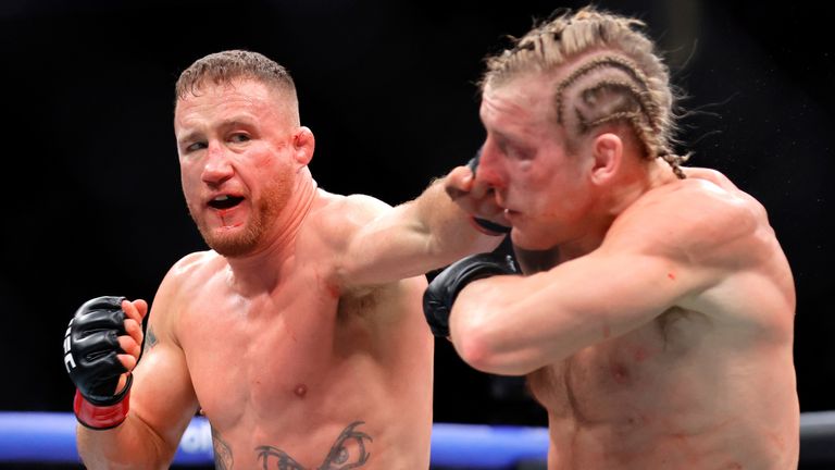 Justin Gaethje punches Paddy Pimblett in a UFC fight (Associated Press)