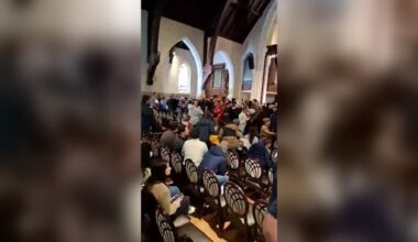DOJ vows to press charges after activists disrupt church where Minnesota ICE official is a pastor