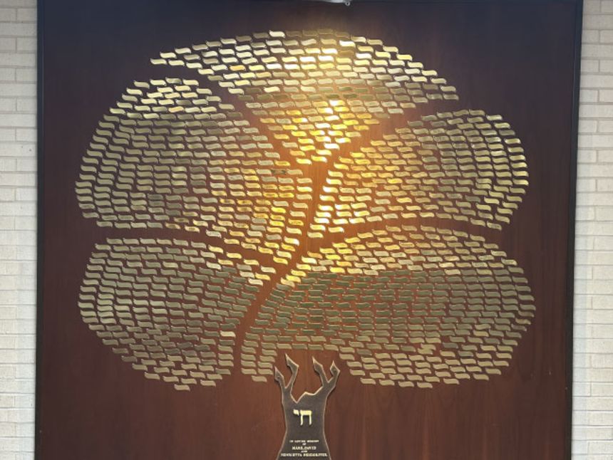 Beth Israel Congregation's Tree of Life art installation, honoring moments of celebration, is seen before the fire.