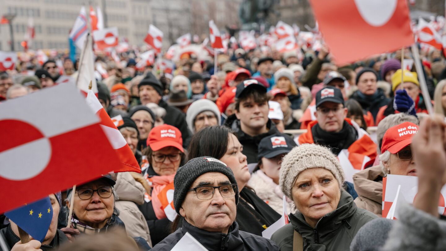 Pro-Greenland protesters wear hats spoofing Trump's MAGA slogan