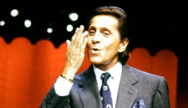 Valentino Garavani greets the audience at the finale of the Valentino Fall 1993 Couture Runway Show on July 21, 1993, in Paris, France.