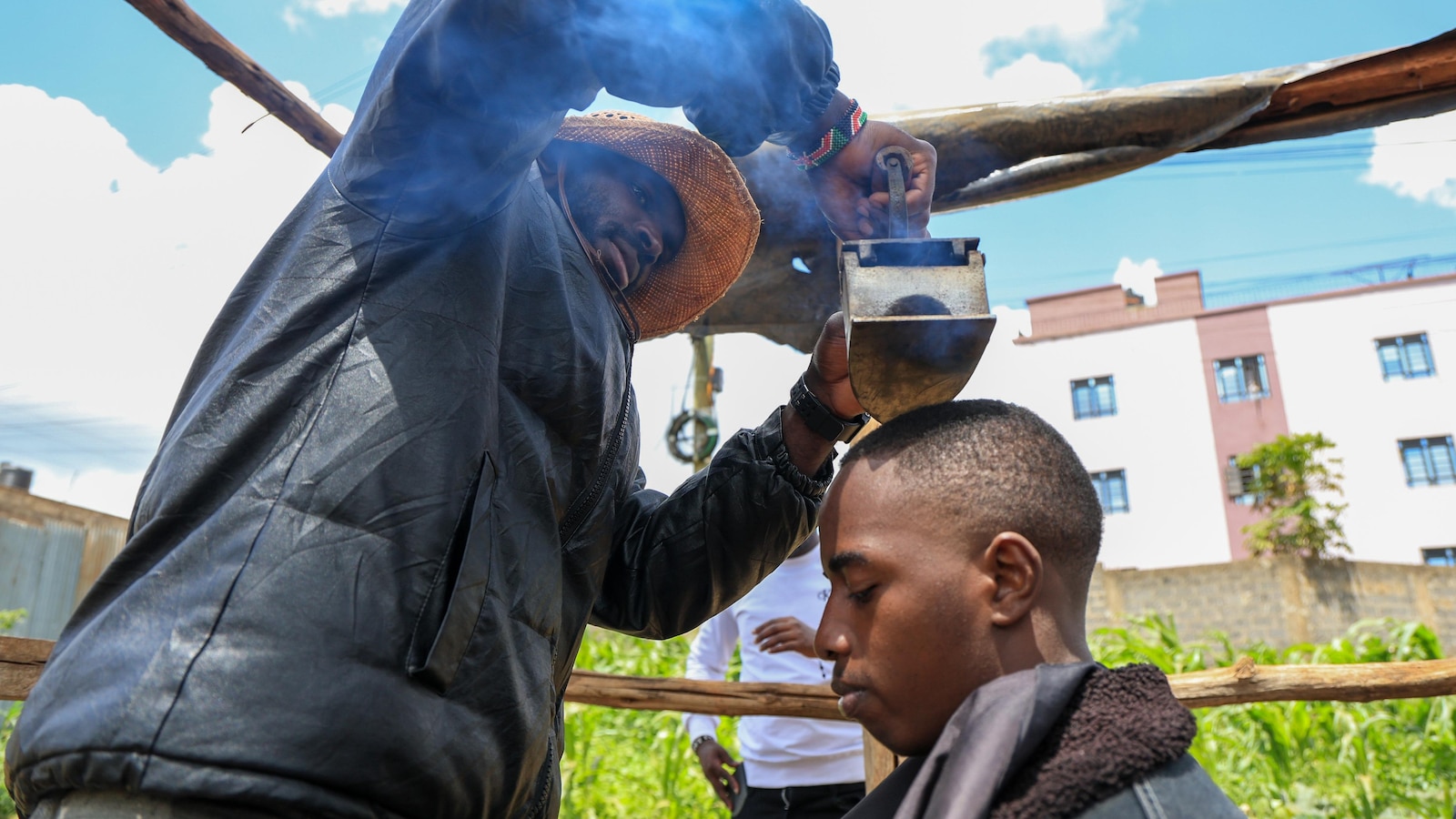 A Kenyan barber who wields a sharpened shovel thrives on Africa's social media craze