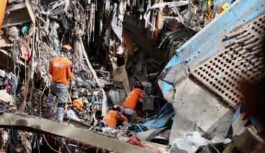 Filipino rescuers detect 'signs of life' in deadly garbage avalanche; dozens missing