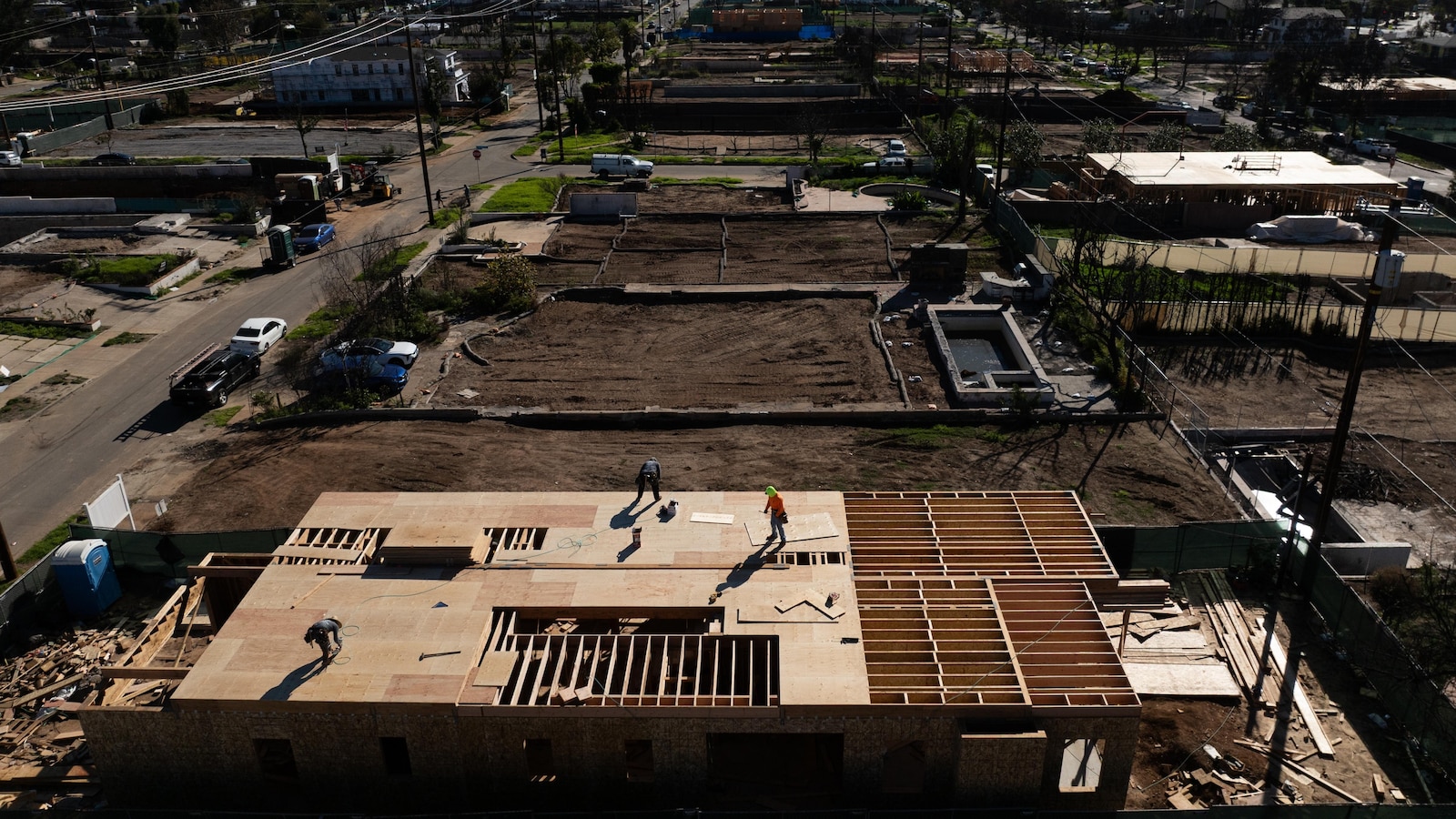 A year after LA-area wildfires destroyed thousands of homes, fewer than a dozen have been rebuilt