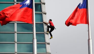 American rock climber Alex Honnold climbs Taipei 101 skyscraper without ropes