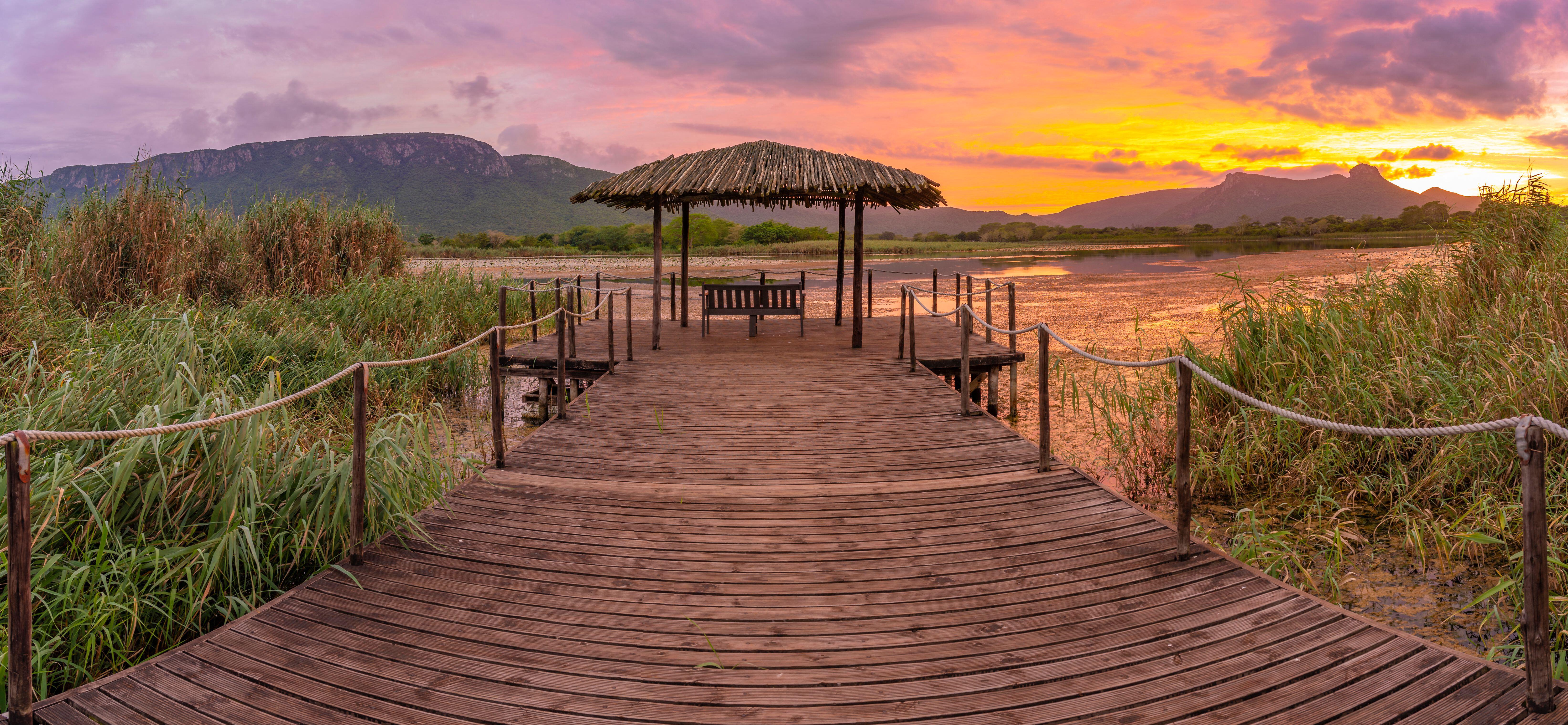 View of Jet Lake and Ubombo Mountain from Ghost Mountain Inn at sunrise, Mkuze, KwaZulu-Natal Province, South Africa.