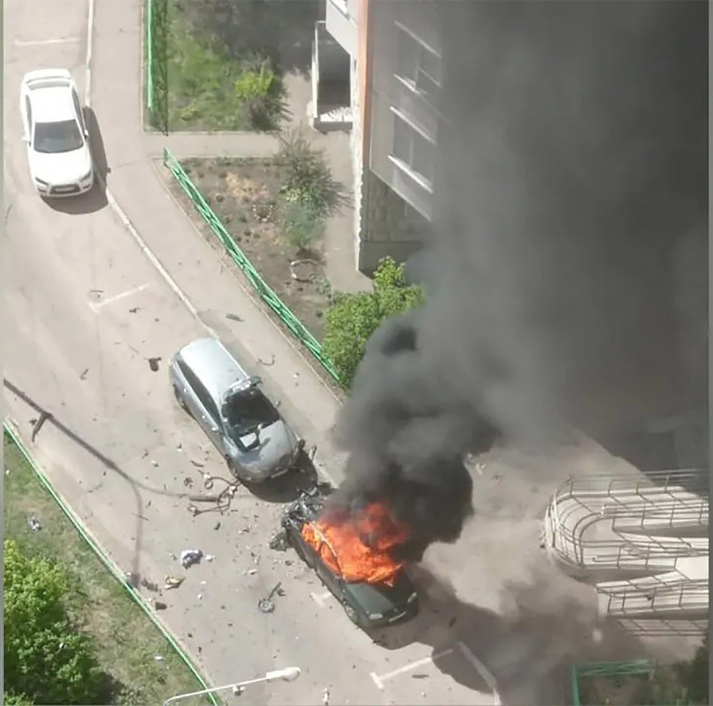 A Volkswagen Golf exploded in Balashikha, Moscow region, with flames and smoke billowing from the vehicle.
