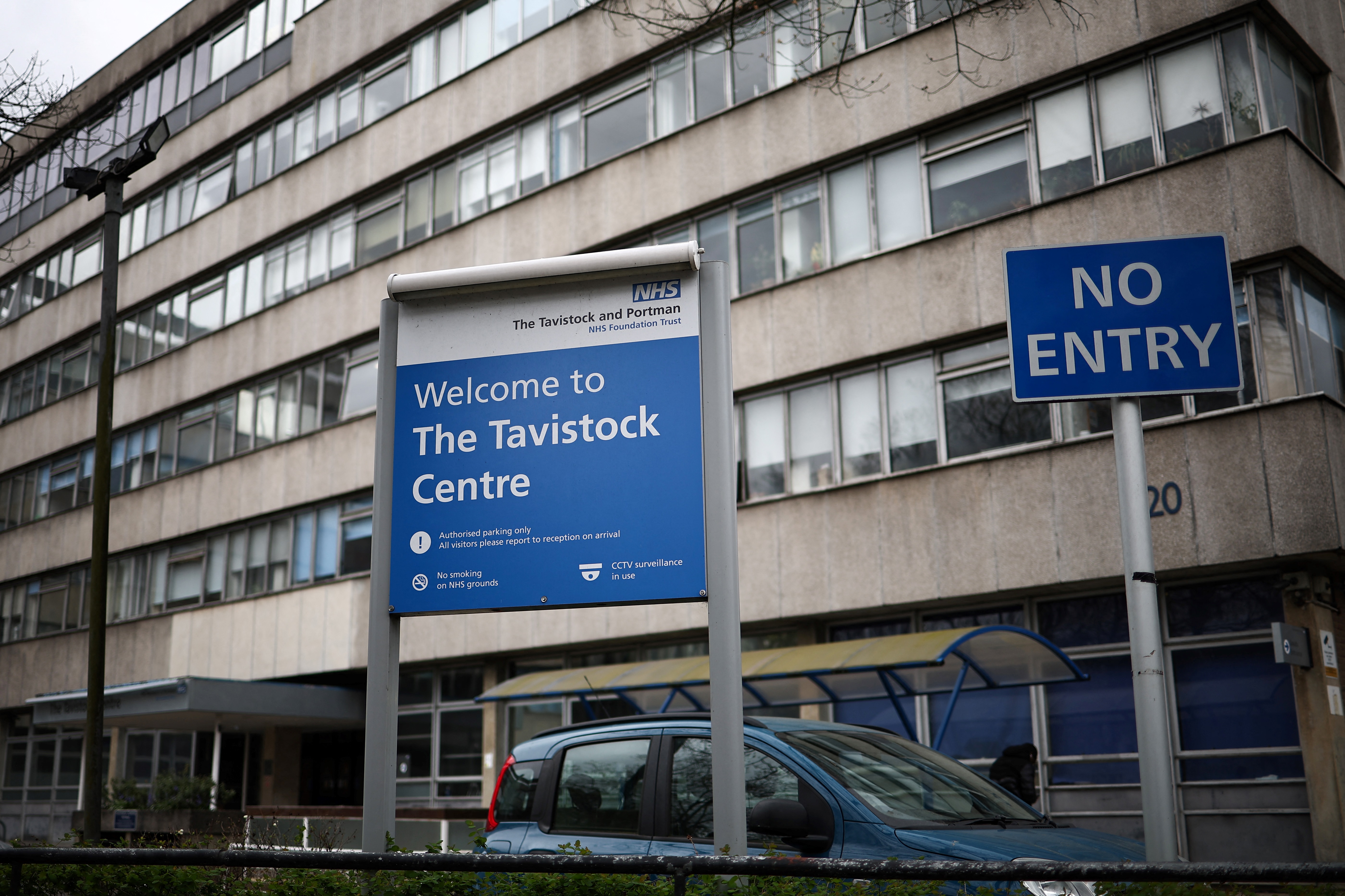 Entrance to the NHS Tavistock Center with a "Welcome to The Tavistock Centre" sign and a "No Entry" sign.