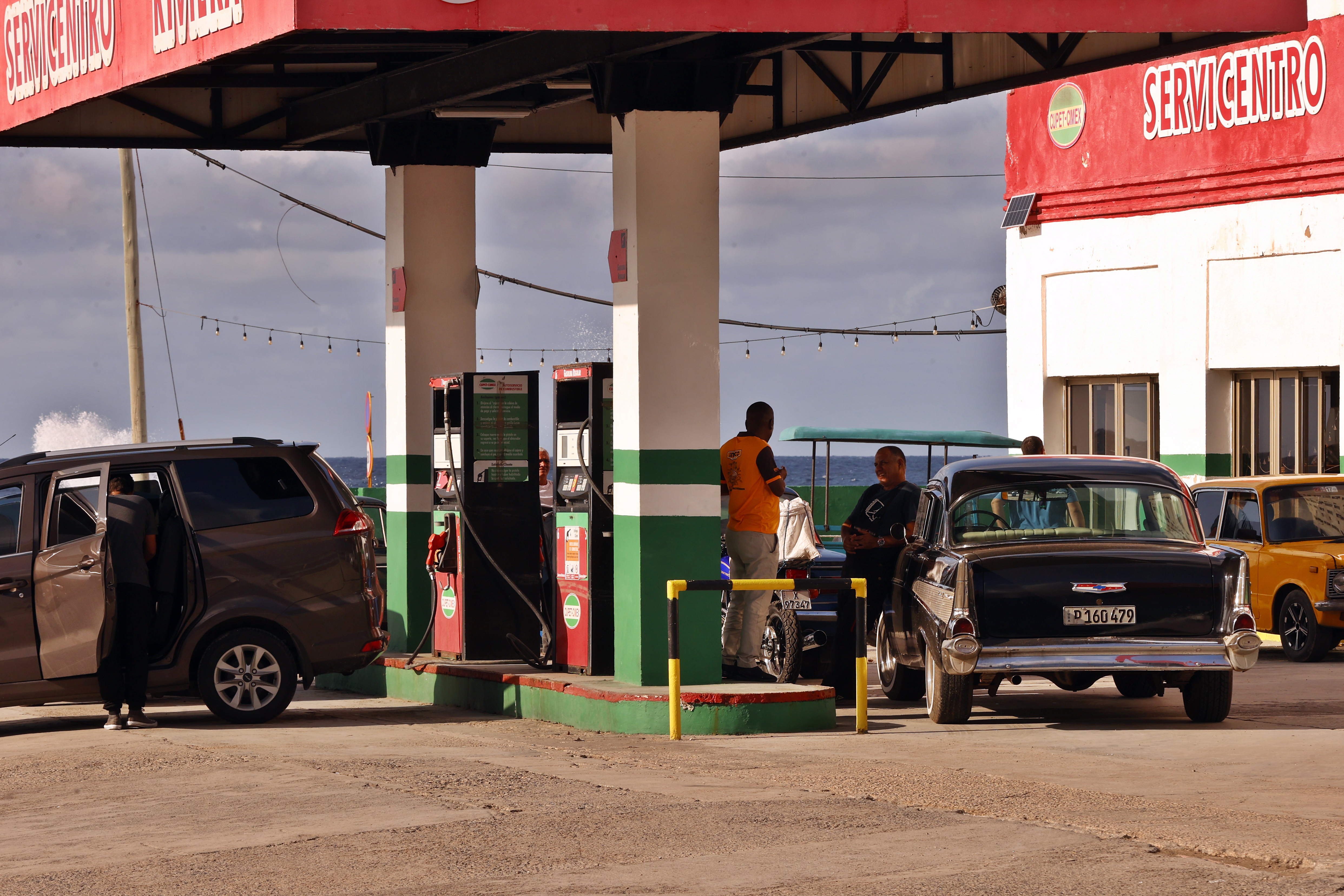Vehicles waiting for fuel at a gas station in Havana, Cuba.