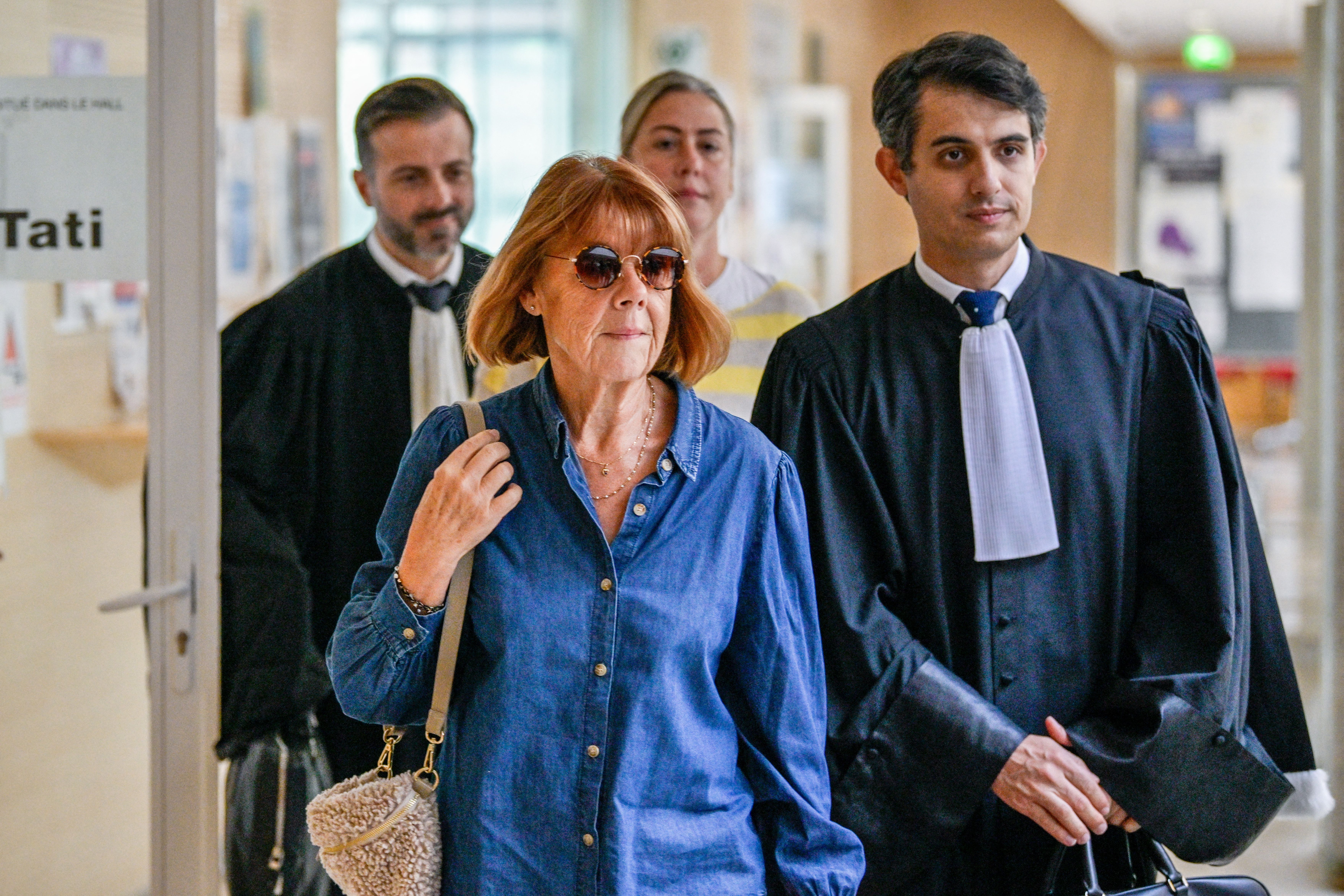 Gisele Pelicot, flanked by her lawyer Stephane Babonneau, arrives at Avignon courthouse.