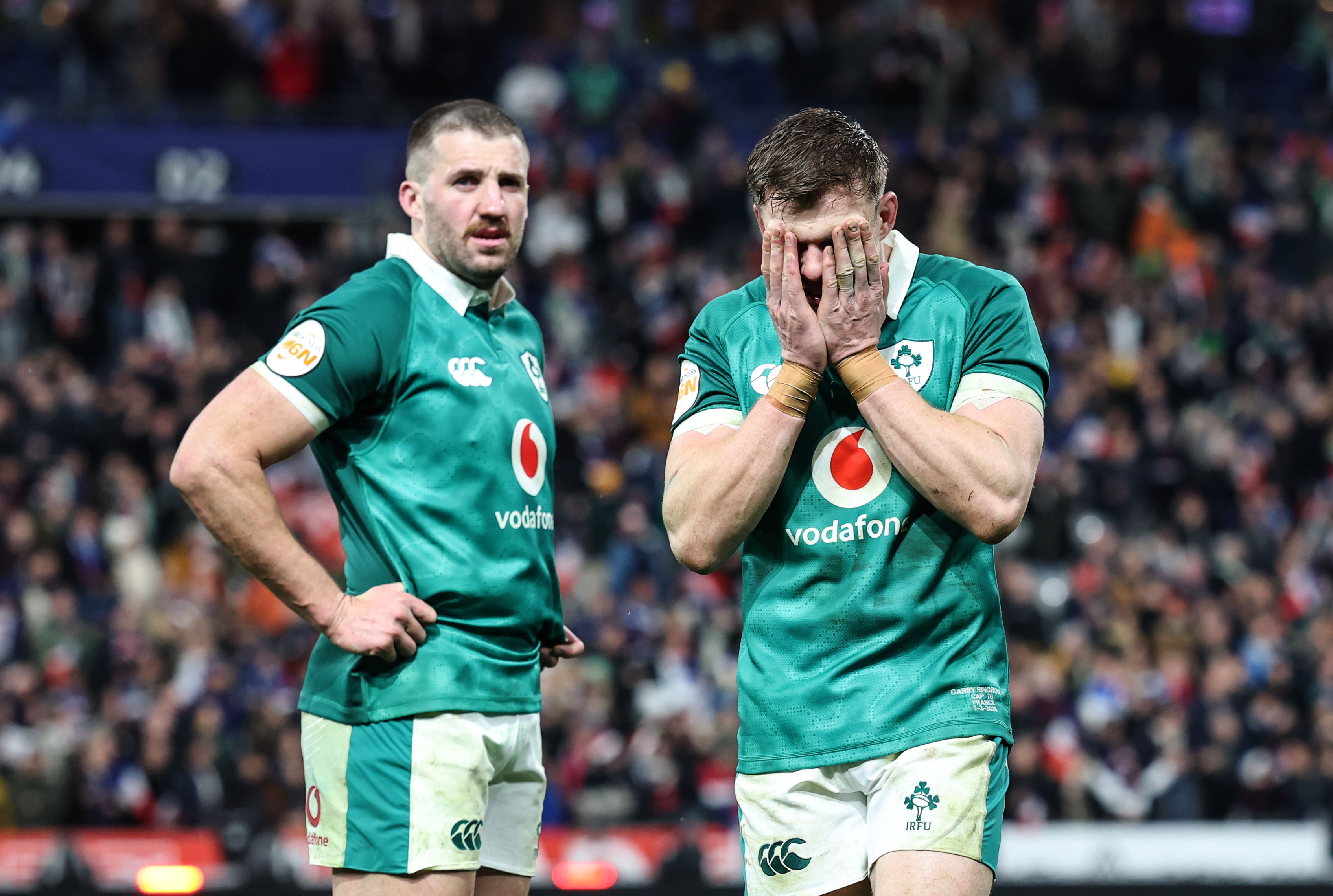 Rugby players Stuart McCloskey and Garry Ringrose look dejected after the Ireland vs. France match.